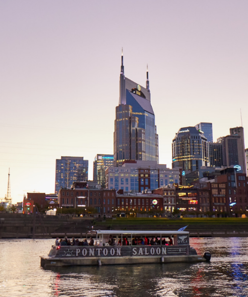 Pontoon Party Cruise Cumberland sunset pontoon cruise in front of nashville skyline