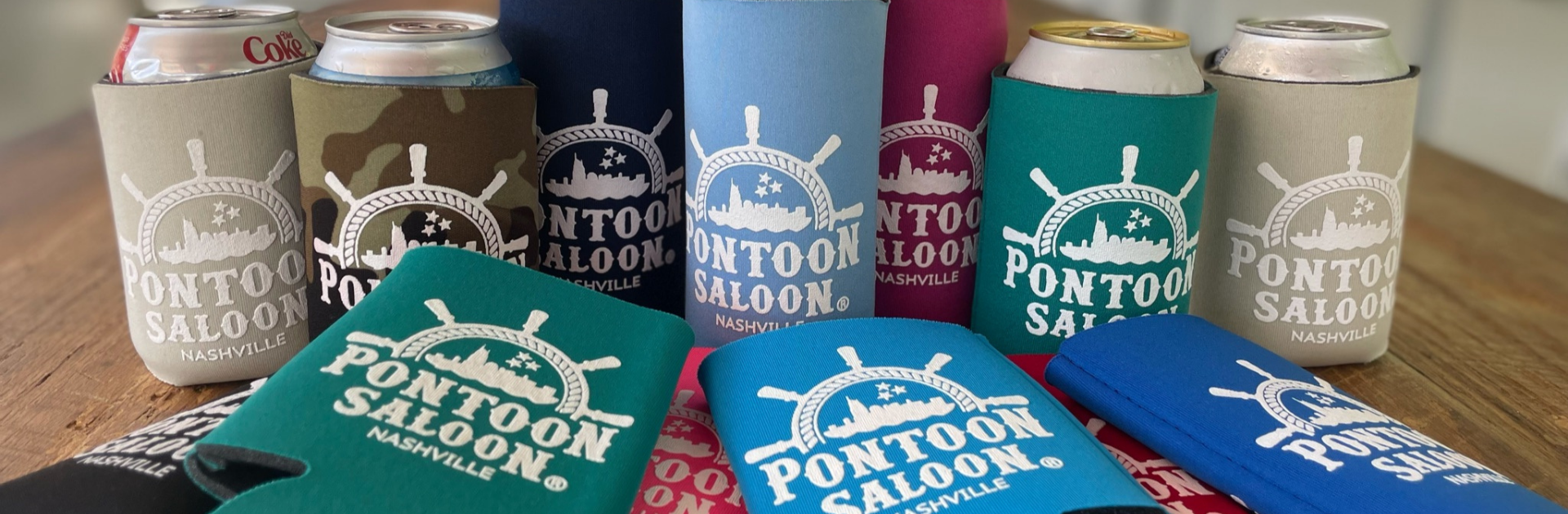 pontoon saloon koozies in different colors