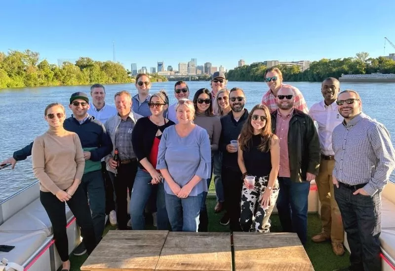 group photo from a corporate pontoon cruise