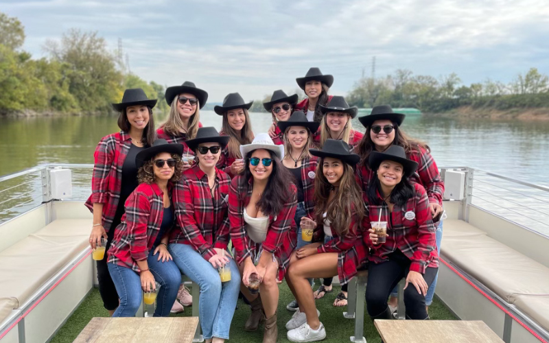 4 girls on the pontoon saloon in the fall